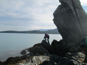 Kane climbing around Otter Rock.  