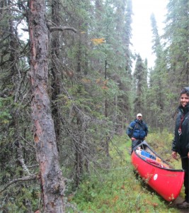 Portaging the canoe to Canoe Lake 2.  I think we got the heavy canoe! 