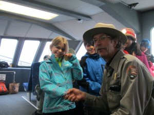 Kat getting her Jr. Ranger badge.