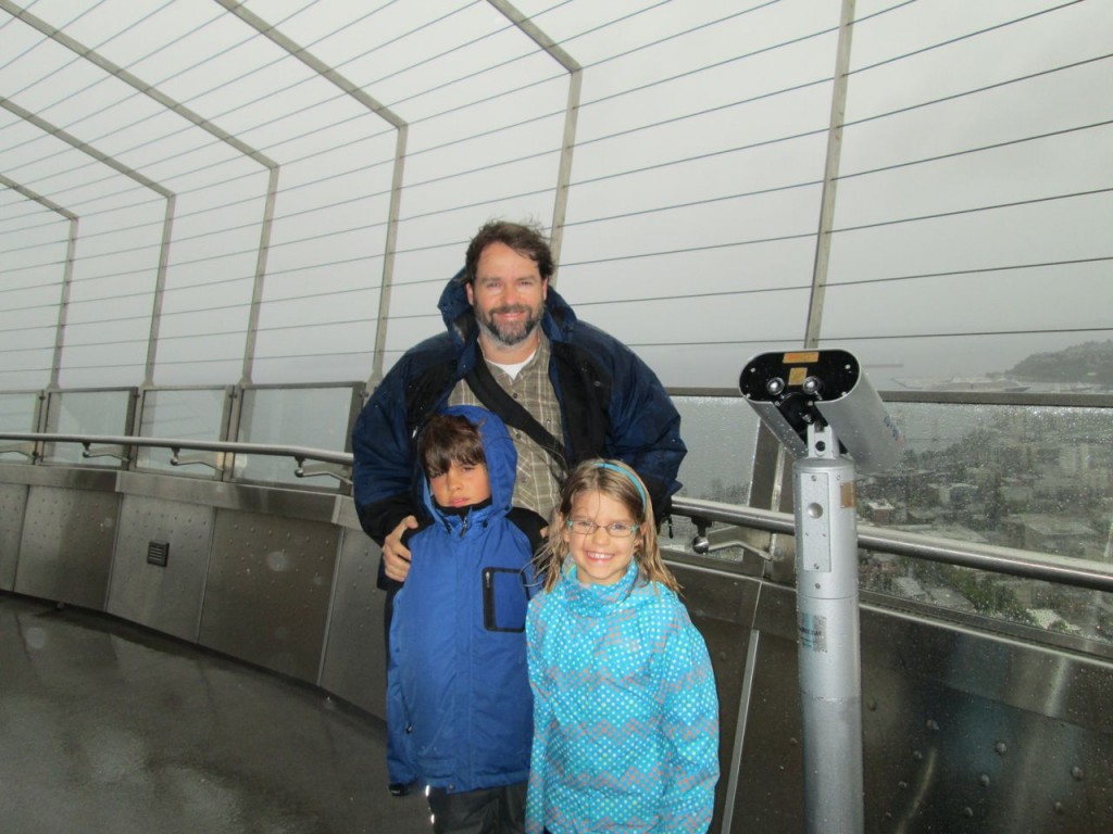 Most of us are happy to be at the Space Needle.  I think Kane just got shutdown on his request for a bag of Lays from the snack bar.