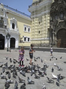 Kane and Kat feeding the pigeons and eating ice cream outside the Monastery. 